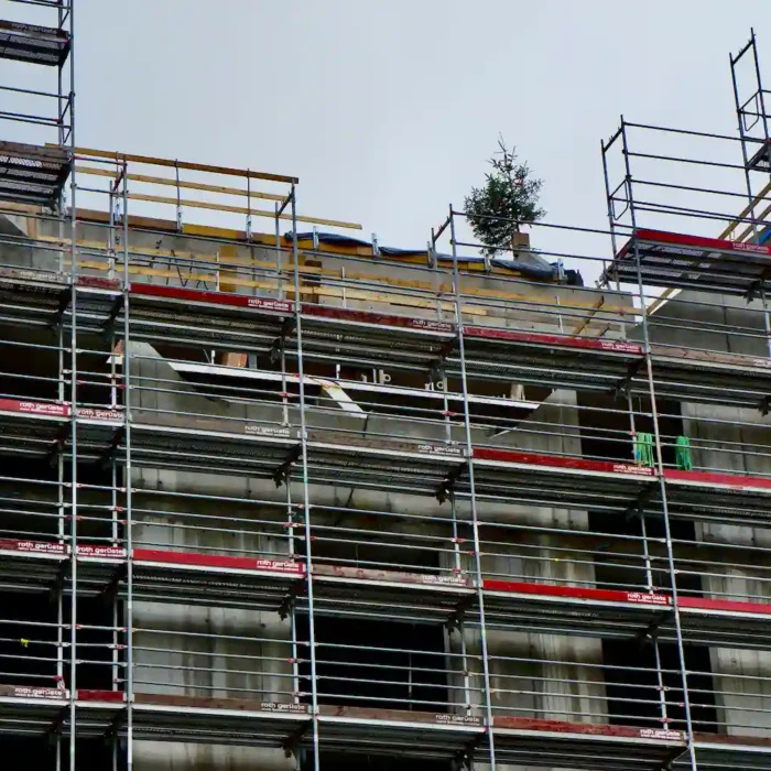 Multi-level scaffolding system installed on a concrete building by San Rafael Scaffolding Rental