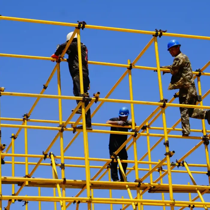 Crew assembling San Rafael Scaffolding Rental equipment on an active worksite
